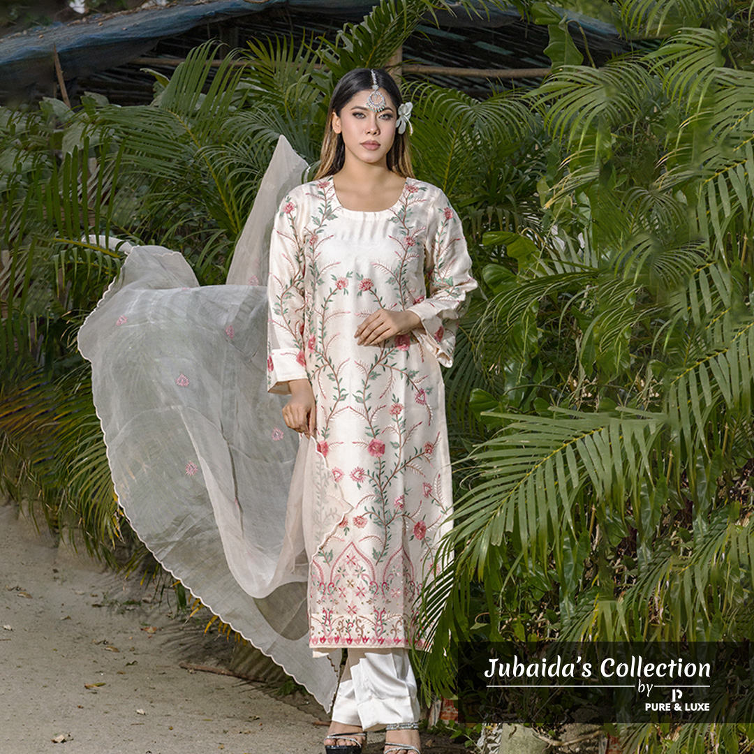 Model wearing Blush Bloom embroidered muslin-silk 3-piece dress in ivory with pink floral designs – Jubaida's Collection