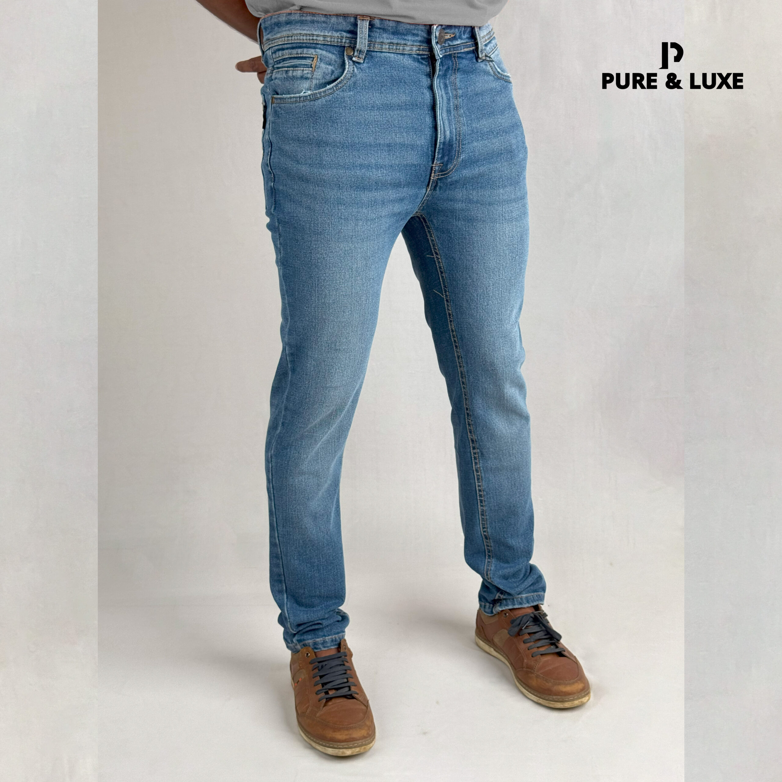 Right front view of Mid Blue Slim Fit Jeans – Urban Wash Denim for Men – Pure & Luxe Street Style Look