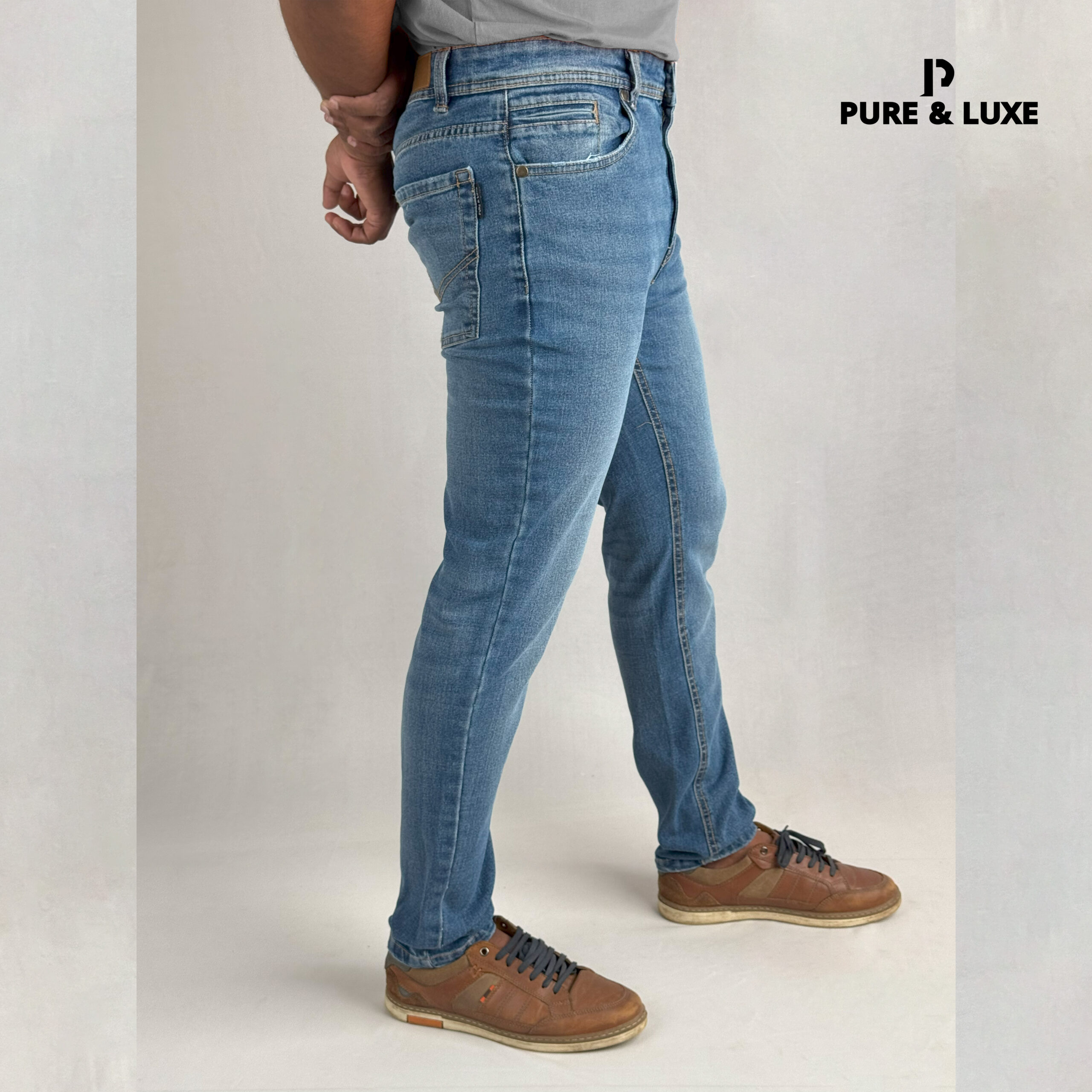 Right side view of Mid Blue Slim Fit Jeans – Urban Wash Denim for Men – Pure & Luxe Street Style Look