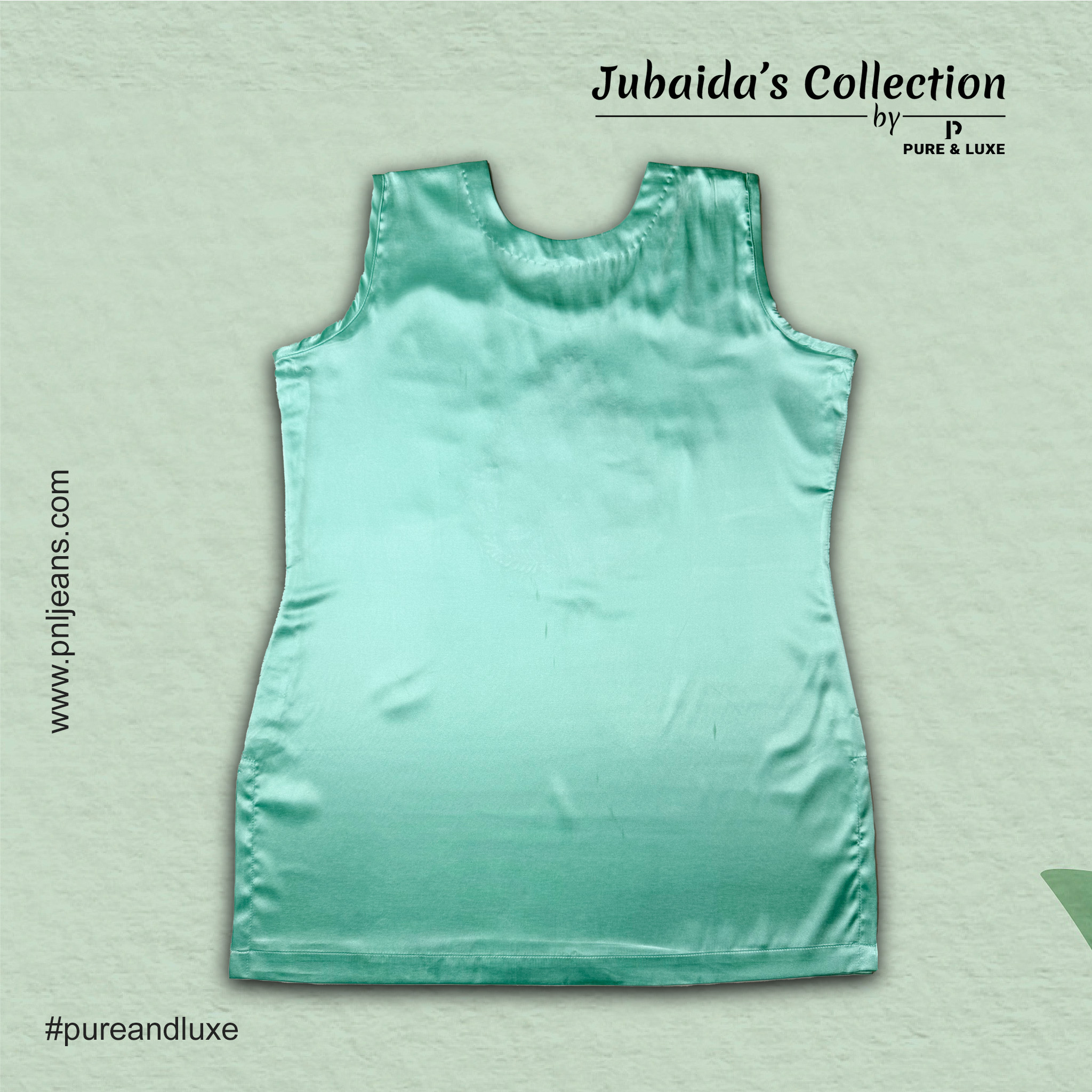 Back view of the silk inner layer of the Two-Piece Kurti Set, showcasing fine threadwork on a soft, elegant fabric.