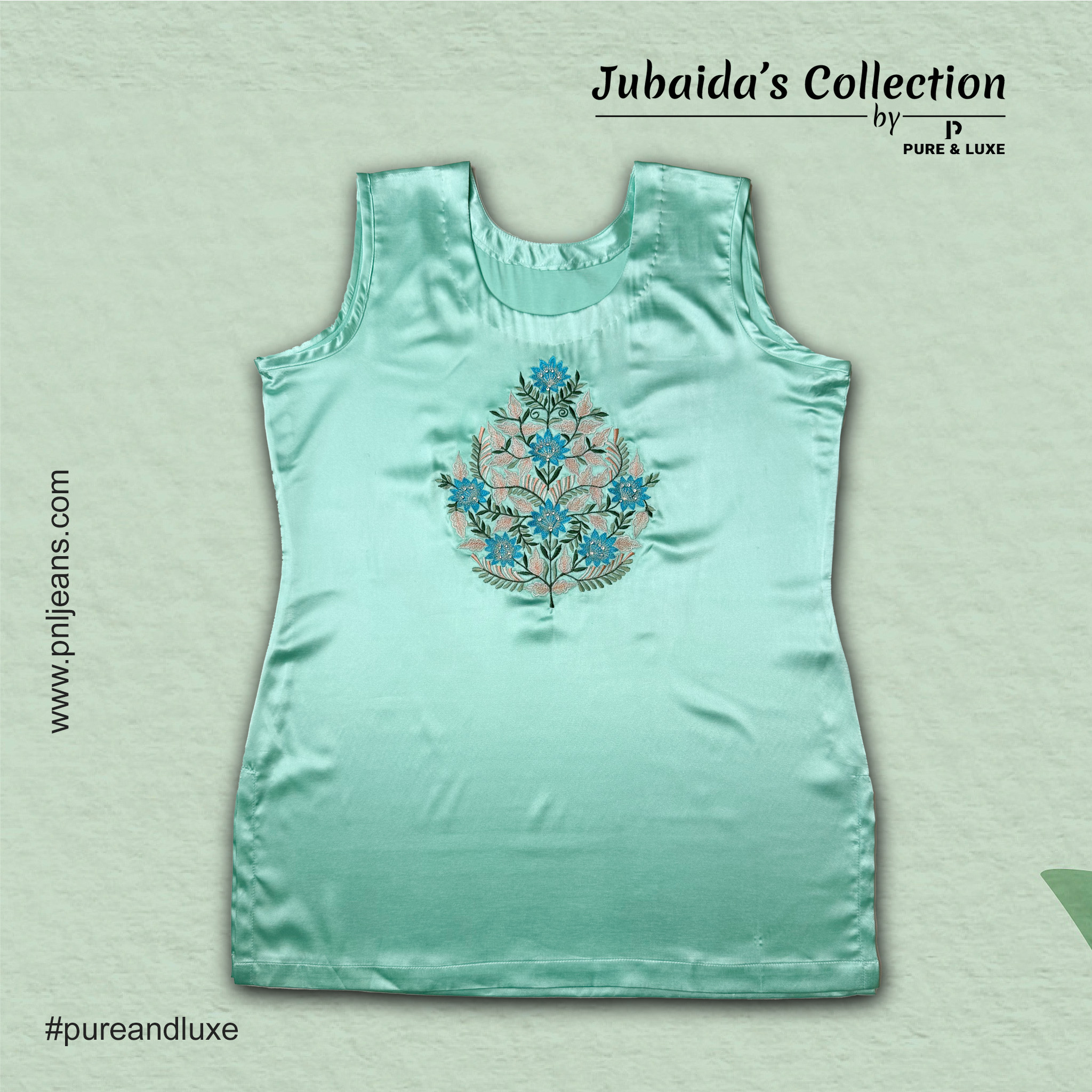 Front view embroidery on the silk inner layer of the Two-Piece Kurti Set, showcasing fine threadwork on a soft, elegant fabric.