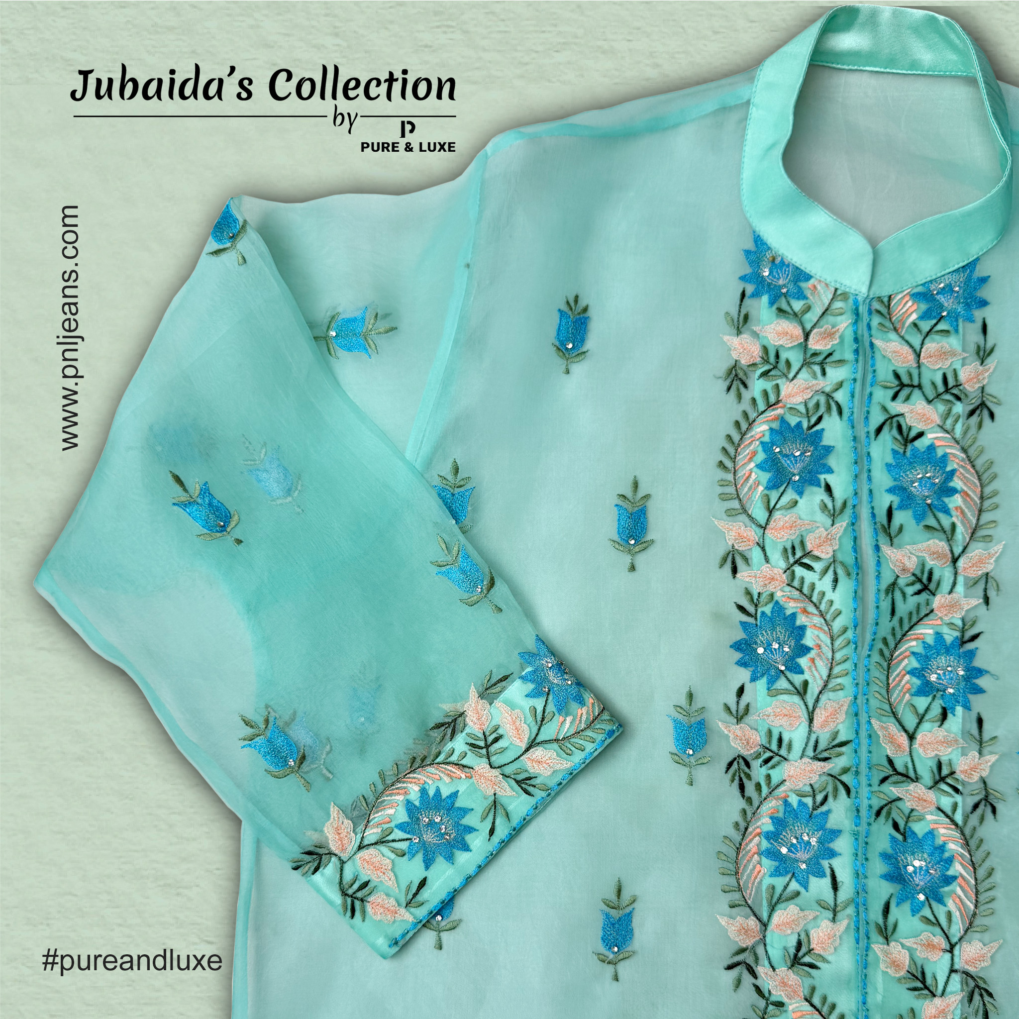 Close-up view of right front embroidery on the muslin outer layer of the Two-Piece Kurti Set, showcasing fine threadwork on a soft, elegant fabric.