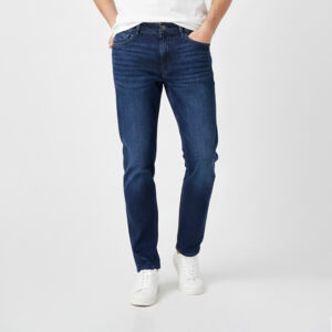 Premium PURE & LUXE Dark Blue Regular Fit Jeans for men featuring a classic straight leg and white sneaker pairing