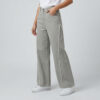 Female model wearing PURE & LUXE Ash Grey Frayed panel Baggy fit Jeans featuring vertical raw-edge detailing and a relaxed wide-leg silhouette.
